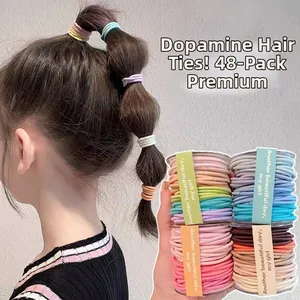 Dettaglio del set di 48 elastici per capelli colorati ad alta elasticità per bambini