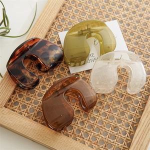 Set of four minimalist resin hair claws in tortoise shell and amber for a vintage look