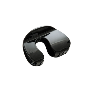 Minimalist black glossy hair claw clip in a large vintage U-shaped shark clip design