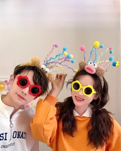 Detail view of cute cartoon plush headband with colorful springs and flower sunglasses