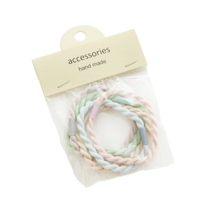 Élastiques à cheveux couleurs macaron avec tissage en spirale sous emballage
