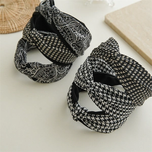 Elegant wide houndstooth and paisley knotted headbands for a vintage high crown look