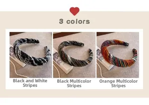 Three colors of chunky knit headbands including black, white and orange mixed stripes