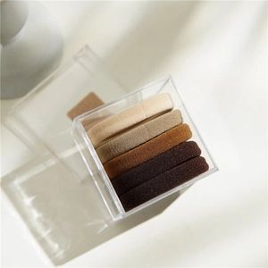 Cinque elastici per capelli senza cuciture dai toni terra con scatola trasparente