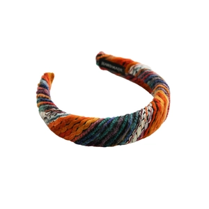 Chic multi-color knitted headband in bohemian style with handmade fabric label