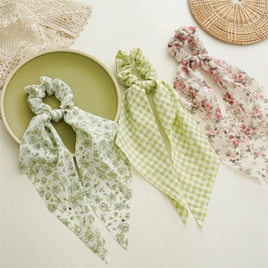 Floral and plaid chiffon scrunchies with long ribbons in light green and pink tones