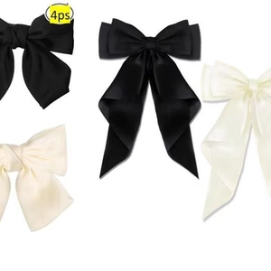 Set di quattro fermagli per capelli in raso con nastri lunghi in nero e bianco crema