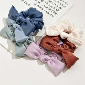 Five-piece set of satin silk bow hair scrunchies in deep blue, lilac, and caramel colors