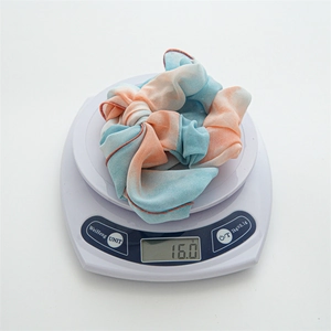 Tie-dye chiffon double layered bow scrunchie for women with elegant blue and orange gradient