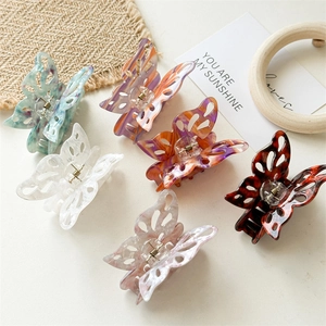 Set of 6 large hollow butterfly hair claws in various marble and tortoiseshell patterns