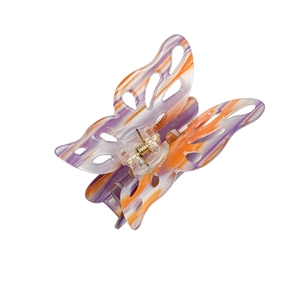 Large butterfly hair claw clip with purple and orange marble texture for women
