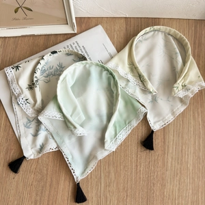 Ink style bamboo print triangle headband with delicate lace edges and black tassels