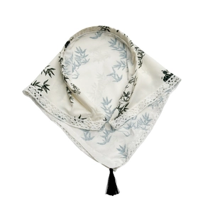 Ink wash bamboo print triangular headscarf with white lace trim and black tassel detail