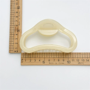 Large 10cm creamy beige curved hair claw clip shown with ruler for size reference