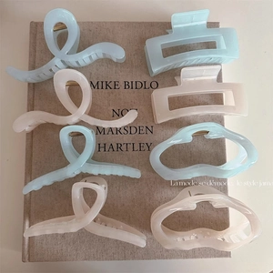 8-piece set of matte shark hair clips in pastel blue and beige for women hairstyle