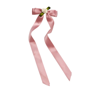Elegant rose bow hair clip with long satin ribbons in dusty pink and floral detail