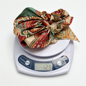 Retro paisley pattern long ribbon hair scrunchie weighing only 12.9g on a scale