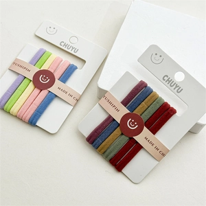 Close-up of six-piece high-elasticity plush hair ties in vibrant macaron and retro colors