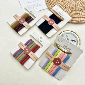 Detail view of 6-pack high-elastic candy color hair ties on premium paper cards