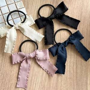 Silk satin scrunchies with bow design in black, white, pink and navy blue for women