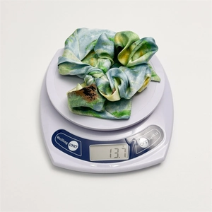 Artistic oil painting style scrunchie with blue-green tie-dye pattern weighing 13.7g