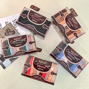 Flat lay of 10-piece high elasticity towel ring hair tie sets in assorted milk coffee colors