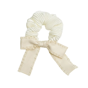 Elegant cream white pleated scrunchie with long ruffled bow decoration for women