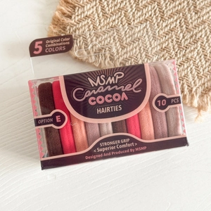 Top view of ten high-elastic milk coffee color hair ties in a transparent gift box