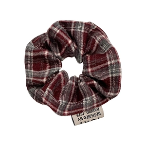 Vintage red and grey plaid scrunchie with designer brand label for classic hairstyles