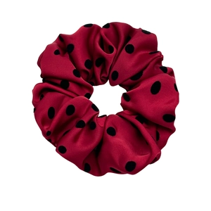 Polka dot satin scrunchie in red with black spots, minimalist elastic hair tie accessory