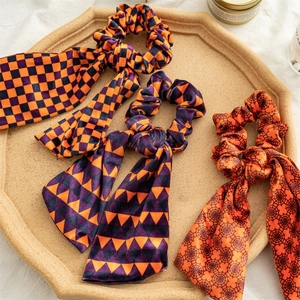 Set di elastici per capelli in velluto per Halloween con nastri lunghi in arancione e viola