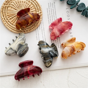 Set of 6 large marble star pattern acrylic hair claws for women in elegant earth tones