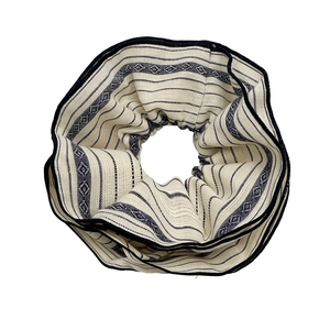 Ethnic style beige and blue striped oversized fabric scrunchie with woven texture