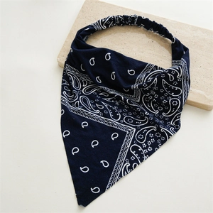 Close-up of navy blue paisley print bandana with high elasticity for headwear
