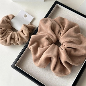 Plush camel-colored oversized scrunchies set with soft sheepskin texture for women
