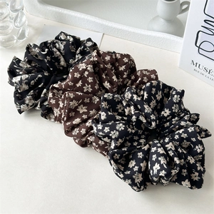Three-piece floral oversized scrunchie set in black and brown elegant chiffon fabric