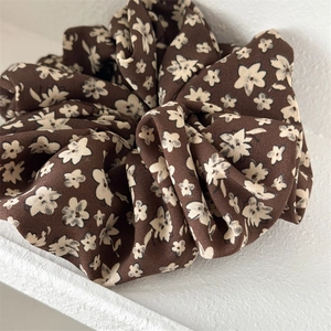 Elegant oversized floral scrunchie in dark brown with cream white prints for women