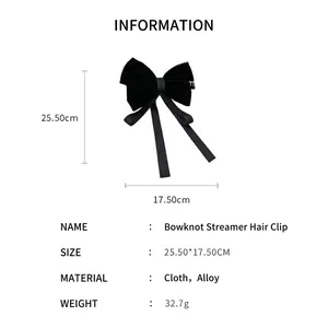 Large black velvet bow hair clip with ribbons and dimensions 25.5cm x 17.5cm