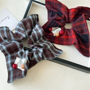 Retro red and blue plaid scrunchies with bead charms and vintage SMILE fabric labels