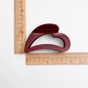 French vintage wine red heart hollow hair claw clip measuring 10cm on white background