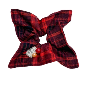Red plaid checkered fabric hair scrunchie with bow shape and decorative beads