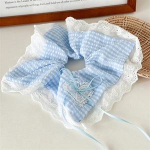 Blue plaid oversized scrunchie with white lace embroidery and heart-shaped ribbon bow