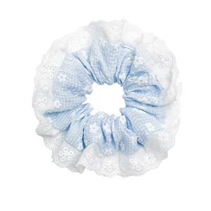 Floral lace scrunchie in light blue with white petals for sweet 2025 hairstyles