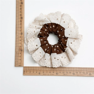 Lace embroidery floral hair scrunchie in coffee brown with rulers showing 14cm size