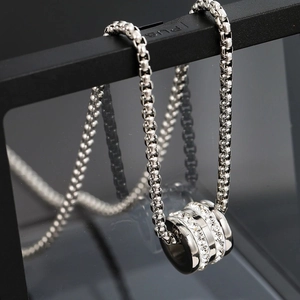 Polished silver titanium steel cylinder necklace with fine white zircon inlays and box chain