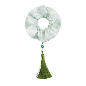 Elegant ink-style floral scrunchie with green beaded tassel and dark green silk fringe