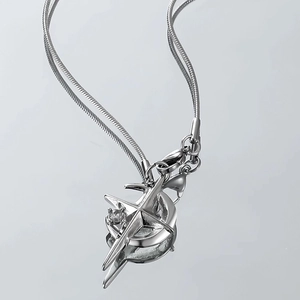 Silver starburst pendant necklace with snake chain and small zircon stone