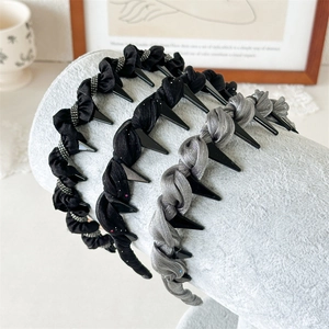 Detailed set of elegant pleated headbands in black and grey with non-slip inner teeth