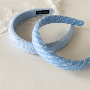 Light blue plaid sponge headband set with silver studs and handmade fabric label