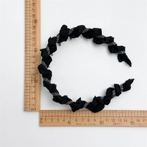 Elegant black pleated headband with silver beads and non-slip teeth for high crown styling